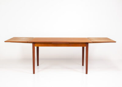 Danish extendable dining table in teak