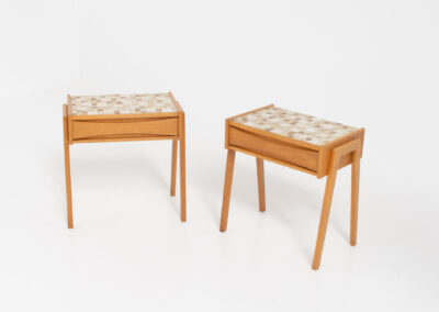 Pair of oak nightstands with mosaic tiles (Denmark, 1970s). They have a very minimalistic design and one shelve with beautiful inset handles. The top is covered with mosaic tiles which gives them a funky look. In very good condition.