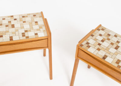 Pair of oak nightstands with mosaic tiles (Denmark, 1970s). They have a very minimalistic design and one shelve with beautiful inset handles. The top is covered with mosaic tiles which gives them a funky look. In very good condition.