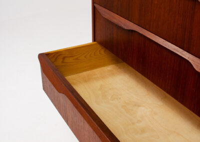 Danish tallboy chest of drawers in teak