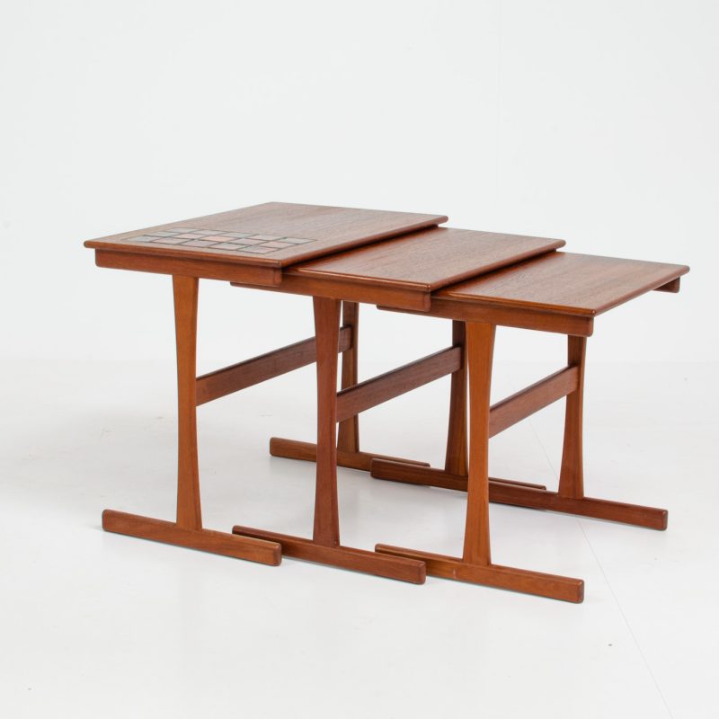 Set of nesting tables with enameled tiles