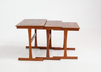 Set of nesting tables with enameled tiles