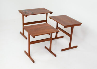 Set of nesting tables with enameled tiles