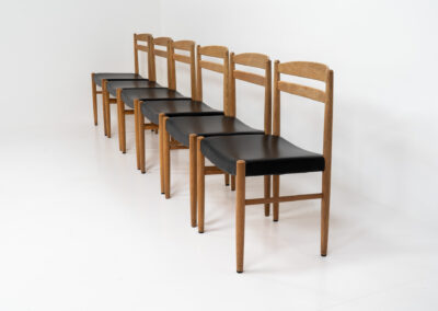Set of 6 oak dining chairs by Carl Ekström for Albin Johansson & Söner (Sweden, 1950s). Featuring solid oak frames and original leather seats. Marked by maker. In very good condition.