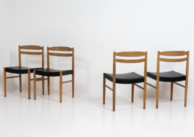 Set of 6 oak dining chairs by Carl Ekström for Albin Johansson & Söner (Sweden, 1950s). Featuring solid oak frames and original leather seats. Marked by maker. In very good condition.