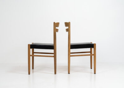 Set of 6 oak dining chairs by Carl Ekström for Albin Johansson & Söner (Sweden, 1950s). Featuring solid oak frames and original leather seats. Marked by maker. In very good condition.