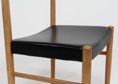 Set of 6 oak dining chairs by Carl Ekström for Albin Johansson & Söner (Sweden, 1950s). Featuring solid oak frames and original leather seats. Marked by maker. In very good condition.