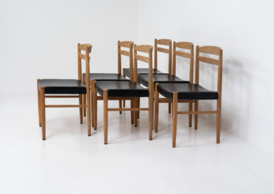 Set of 6 oak dining chairs by Carl Ekström for Albin Johansson & Söner (Sweden, 1950s). Featuring solid oak frames and original leather seats. Marked by maker. In very good condition.