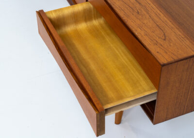 Exceptional Paola sideboard by Oswald Vermaercke for V-Form (Belgium, 1959). An amazing design with a lot of details and a highly sought after extra low height. Featuring two folding doors and four drawers with nice bent wood insides. This unusual low case piece can be perfectly used to put a tv on. In very good condition with some color differences on the top due to UV exposure.