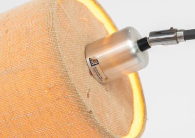 “Variant” floor lamp by Jo Hammerborg for Fog & Mørup (Denmark, 1960s). A very rare model of Fog & Mørup’s floor lamps with an unusual hessian lamp shade. It gives a very cozy and warm light glow. The lamp is switched on with a foot switch and is adjustable in angle. In good condition with some visible using traces on the metal. Marked by maker.