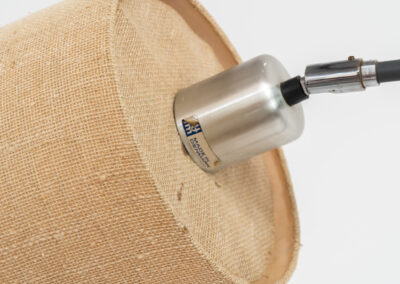 “Variant” floor lamp by Jo Hammerborg for Fog & Mørup (Denmark, 1960s). A very rare model of Fog & Mørup’s floor lamps with an unusual hessian lamp shade. It gives a very cozy and warm light glow. The lamp is switched on with a foot switch and is adjustable in angle. In good condition with some visible using traces on the metal. Marked by maker.