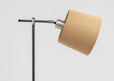 “Variant” floor lamp by Jo Hammerborg for Fog & Mørup (Denmark, 1960s). A very rare model of Fog & Mørup’s floor lamps with an unusual hessian lamp shade. It gives a very cozy and warm light glow. The lamp is switched on with a foot switch and is adjustable in angle. In good condition with some visible using traces on the metal. Marked by maker.