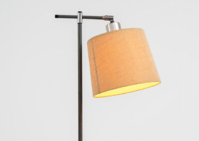 “Variant” floor lamp by Jo Hammerborg for Fog & Mørup (Denmark, 1960s). A very rare model of Fog & Mørup’s floor lamps with an unusual hessian lamp shade. It gives a very cozy and warm light glow. The lamp is switched on with a foot switch and is adjustable in angle. In good condition with some visible using traces on the metal. Marked by maker.