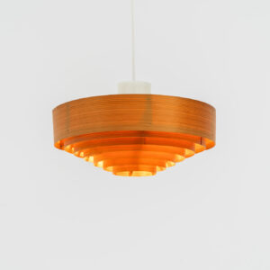 Pine pendant light by Hans-Agne Jakobsson for Ellysett (Sweden, 1960s).The body is made out of pine slats nailed togheter. It can be mounted directly to the ceiling or used as a hanging lamp like it is now. In good condition and newly rewired.