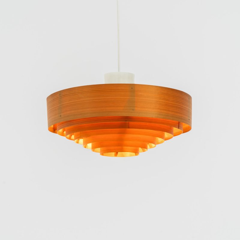 Pine pendant light by Hans-Agne Jakobsson for Ellysett (Sweden, 1960s).The body is made out of pine slats nailed togheter. It can be mounted directly to the ceiling or used as a hanging lamp like it is now. In good condition and newly rewired.