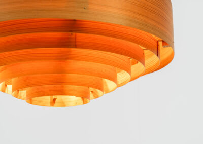 Pine pendant light by Hans-Agne Jakobsson for Ellysett (Sweden, 1960s).The body is made out of pine slats nailed togheter. It can be mounted directly to the ceiling or used as a hanging lamp like it is now. In good condition and newly rewired.