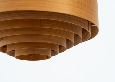 Pine pendant light by Hans-Agne Jakobsson for Ellysett (Sweden, 1960s).The body is made out of pine slats nailed togheter. It can be mounted directly to the ceiling or used as a hanging lamp like it is now. In good condition and newly rewired.
