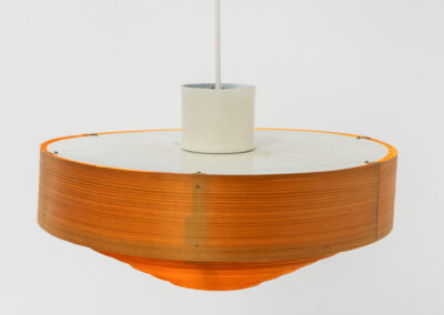 Pine pendant light by Hans-Agne Jakobsson for Ellysett (Sweden, 1960s).The body is made out of pine slats nailed togheter. It can be mounted directly to the ceiling or used as a hanging lamp like it is now. In good condition and newly rewired.