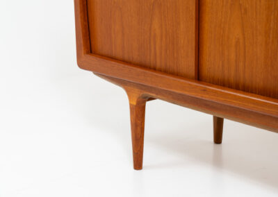 Stunning Danish sideboard in teak, 1960s. This piece is absolutely gorgeous! We are not sure who designed it, but it is referred to “K.L. Dansk” online. It’s extremely detailed and built to very high quality standards. It features four sliding doors with adjustable shelves and three drawers inside. The rounded edges and organic shapes on this piece are just amazing. In perfect condition!