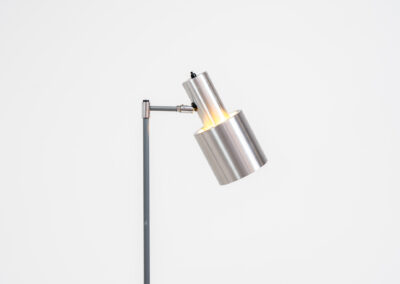 “Studio” floorlamp by Jo Hammerborg for Fog & Mørup (Denmark, 1960s). A design icon in original condition. It’s made out of metal and brushed aluminium. Adjustable in angle. In very good condition with some scratches on the base.