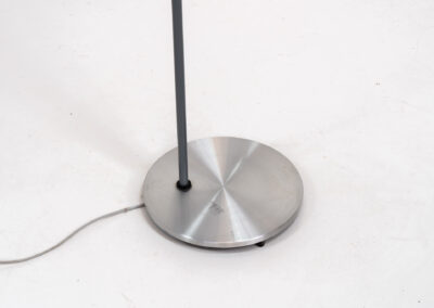 “Studio” floorlamp by Jo Hammerborg for Fog & Mørup (Denmark, 1960s). A design icon in original condition. It’s made out of metal and brushed aluminium. Adjustable in angle. In very good condition with some scratches on the base.