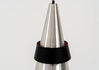 “Corona” pendant light by Jo Hammerborg for Fog & Mørup (Denmark, 1960s). If there’s an opposite of boring, this lamp is definitely it! Made out of brushed aluminium with a black halo, the black ring is lacquered in purple on the inside. In very good condition!