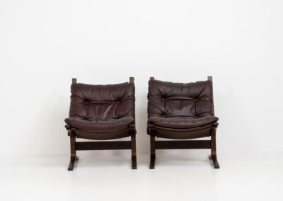 Pair of “Siesta” lounge chairs by Ingmar Relling for Westnofa (Norway, 1960s). One of the most comfortable chairs we have ever sat in! Made with leather and bentwood. The leather is still original and in amazing condition! Can be sold separately if requested.