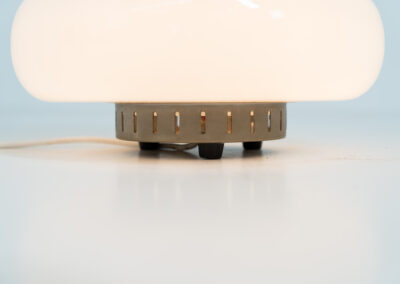 Stunning Spage Age Murano Table lamp (Italy, 1970s). An amazing Space Age piece made out of metal & Murano glass. Inside the glass are three lightbulbs that are easily replaceable. In very good condition!