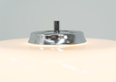 Stunning Spage Age Murano Table lamp (Italy, 1970s). An amazing Space Age piece made out of metal & Murano glass. Inside the glass are three lightbulbs that are easily replaceable. In very good condition!