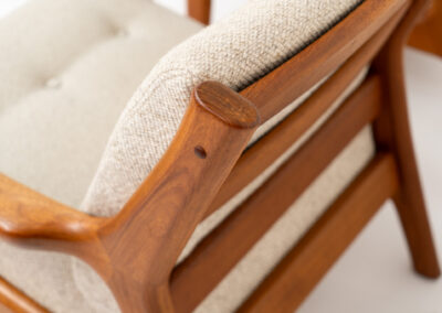 Stunning easy chair by Gustav Thams for A/S Vejen (Denmark, 1960s). The rounded and organic shapes on this one is just impressive. It features a solid teak frame and the original beige upholstery. It seems to us that its not even been used, as the condition of the wood and the fabric is perfect.  