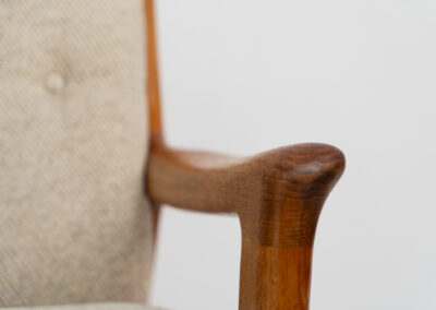Stunning easy chair by Gustav Thams for A/S Vejen (Denmark, 1960s). The rounded and organic shapes on this one is just impressive. It features a solid teak frame and the original beige upholstery. It seems to us that its not even been used, as the condition of the wood and the fabric is perfect.  