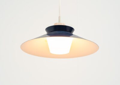 Mid-century opaline glass pendant light (Denmark, 1960s). A beautiful and simple lamp made out of an opaline glass body and an aluminium lamp shade, blue on the outside, white on the inside. In good condition with some signs of age.