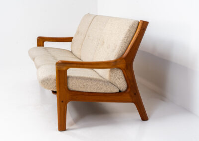 3 seater sofa by Gustav Thams for A/S Vegen (Denmark, 1960s). The rounded and organic shapes on this one is just impressive. It has a solid teak frame and the original beige upholstery. It seems to us that it has not even been used, as the condition of the wood and the fabric is perfect.