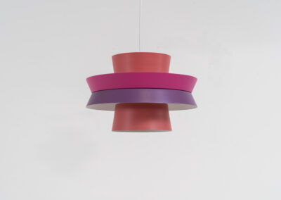 Colourful “Trava” pendant light designed by Carl Thore for Granhaga (Sweden, 1960s). This lamp is surely an eye catcher! It is made out of four aluminium shades laquered in two tints of pink and purple. The lamp is rewired and restored to perfection!