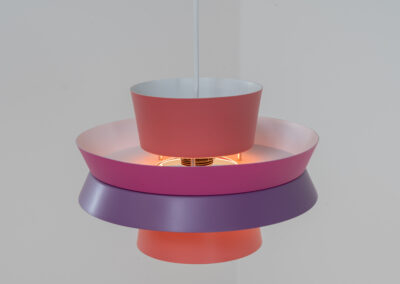 Colourful “Trava” pendant light designed by Carl Thore for Granhaga (Sweden, 1960s). This lamp is surely an eye catcher! It is made out of four aluminium shades laquered in two tints of pink and purple. The lamp is rewired and restored to perfection!