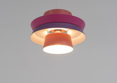 Colourful “Trava” pendant light designed by Carl Thore for Granhaga (Sweden, 1960s). This lamp is surely an eye catcher! It is made out of four aluminium shades laquered in two tints of pink and purple. The lamp is rewired and restored to perfection!