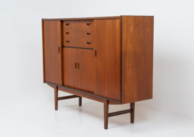 Stunning sideboard in teak by P. Westergaard (Denmark, 1960s). A beautifully crafted piece containing two big sliding doors with lots of storage space, two smaller sliding doors and three drawers. In very good condition!