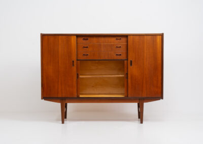 Stunning sideboard in teak by P. Westergaard (Denmark, 1960s). A beautifully crafted piece containing two big sliding doors with lots of storage space, two smaller sliding doors and three drawers. In very good condition!