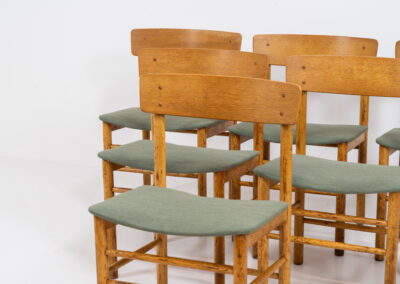 Set of 6 Model 250 dining chairs by Farstrup (Denmark, 1956). They are made out of solid oak frames and a veneered back rest. The seats are newly upholstered in a green fabric. The oak has been beautifully aged! One of them has some veneer damage on the backrest as shown on the pictures. Overall in good condition.