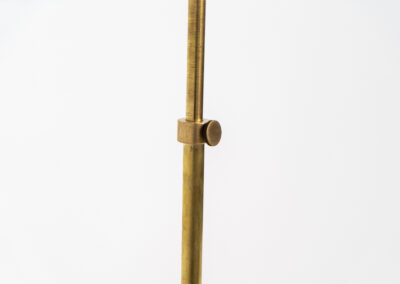 Early model of the “Bellevue AJ7” floor lamp by Arne Jacobsen (Denmark, 1929). This early model of the Bellevue series, made with a solid brass stand, is extremely rare to find. It was designed for “The house of the future” exhibition in Copenhagen in 1929. It is adjustable in height and angle. This piece is fully restored and in amazing condition. The brass has a very nice patina.