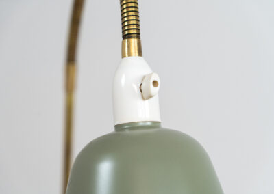 Early model of the “Bellevue AJ7” floor lamp by Arne Jacobsen (Denmark, 1929). This early model of the Bellevue series, made with a solid brass stand, is extremely rare to find. It was designed for “The house of the future” exhibition in Copenhagen in 1929. It is adjustable in height and angle. This piece is fully restored and in amazing condition. The brass has a very nice patina.