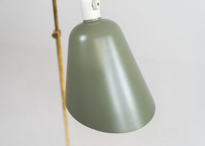 Early model of the “Bellevue AJ7” floor lamp by Arne Jacobsen (Denmark, 1929). This early model of the Bellevue series, made with a solid brass stand, is extremely rare to find. It was designed for “The house of the future” exhibition in Copenhagen in 1929. It is adjustable in height and angle. This piece is fully restored and in amazing condition. The brass has a very nice patina.