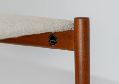 Rare stool by Hugo Frandsen for Spøttrup (Denmark, 1960s). Made with an elegant solid teak frame and newly upholstered in a beige fabric. In perfect condition! Marked by maker.