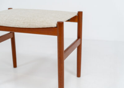 Rare stool by Hugo Frandsen for Spøttrup (Denmark, 1960s). Made with an elegant solid teak frame and newly upholstered in a beige fabric. In perfect condition! Marked by maker.