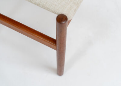 Rare stool by Hugo Frandsen for Spøttrup (Denmark, 1960s). Made with an elegant solid teak frame and newly upholstered in a beige fabric. In perfect condition! Marked by maker.