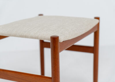 Rare stool by Hugo Frandsen for Spøttrup (Denmark, 1960s). Made with an elegant solid teak frame and newly upholstered in a beige fabric. In perfect condition! Marked by maker.
