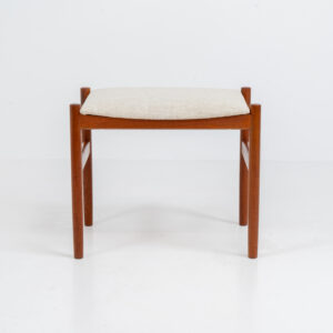 Rare stool by Hugo Frandsen for Spøttrup (Denmark, 1960s). Made with an elegant solid teak frame and newly upholstered in a beige fabric. In perfect condition! Marked by maker.