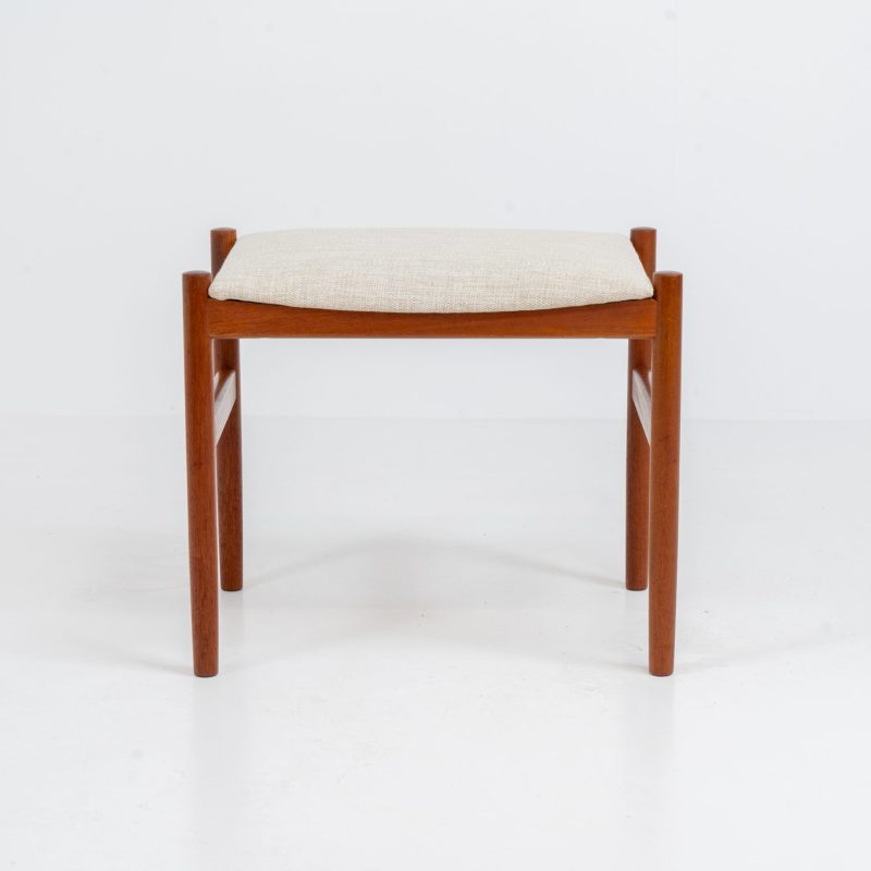 Rare stool by Hugo Frandsen for Spøttrup (Denmark, 1960s). Made with an elegant solid teak frame and newly upholstered in a beige fabric. In perfect condition! Marked by maker.