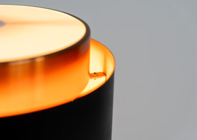 Stunning Saturn pendant light by Jo Hammerborg for Fog & Mørup (Denmark, 1960s). A stunning design with a beatutiful contrast between copper and matte black. At the top and the bottom, the lamp is closed by two acrylic plates that create an anti-dazzle and glare-free effect. A high end piece, made with quality materials. In very good condition! It features the original Fog & Mørup lable inside.