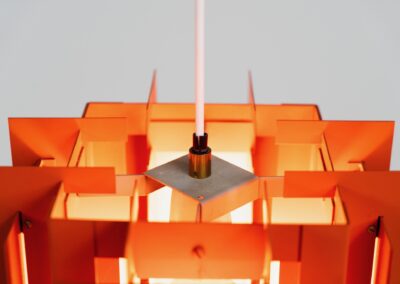 Extremely rare “Octagon” pendant light by Lyfa (Denmark, 1960s). What a spectacular piece! It’s made out of multiple steel slats lacquered in orange and grey, which gives an amazing lighting. It looks different from every angle and will probably never bore you! Newly rewired and in splendit condition. It weighs almost 5kg so make sure the ceiling can support it.